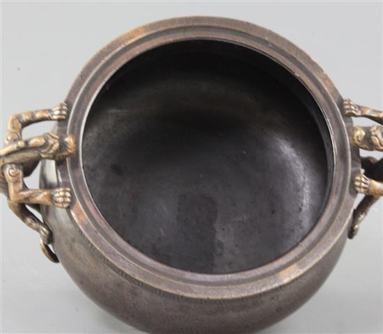 A Chinese bronze ding censer and cover, width 16cm